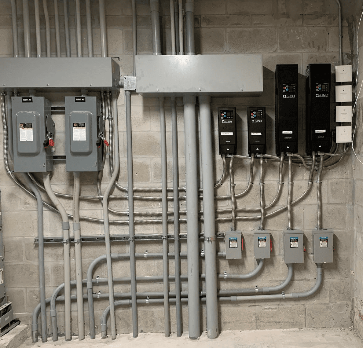 Electrical panels, conduit network, and disconnects in a mechanical room