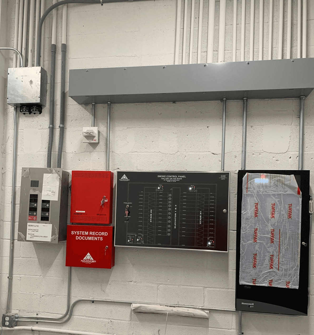 Smoke control panel and fire alarm system documentation cabinet